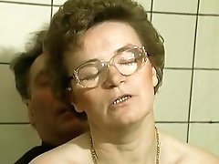 An Old German Lady Gets Her Mouth Covered In The Bathroom