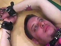 Leather-clad Dominatrixes Restrain And Punish Male Slave In Bdsm Chamber